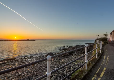 Mousehole is considered one of Cornwall's prettiest fishing villages, with two small sandy beaches inside its harbour quays, only accessible at low tide