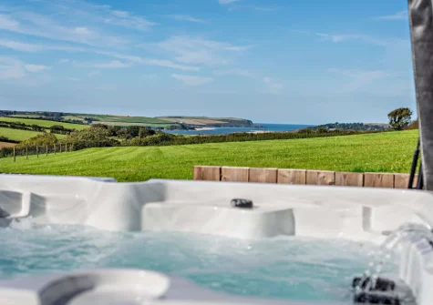 The far reaching countryside view from the hot tub at Roundhouse Mill, St Issey