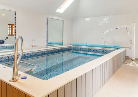The shared heated indoor endless pool at South Torfrey Farm, Golant