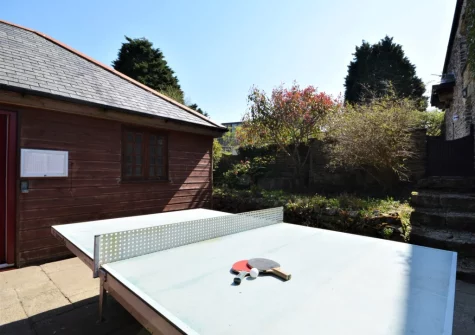 The shared outdoor tabble tennis at South Torfrey Farm, Golant