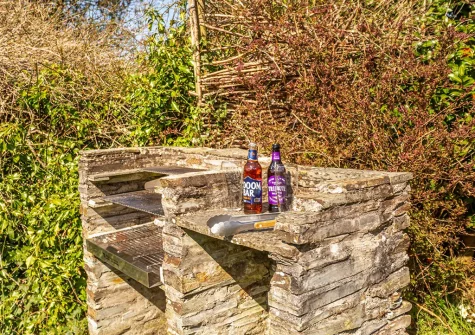 The barbecue area & garden at Ruth's Cottage, St Teath