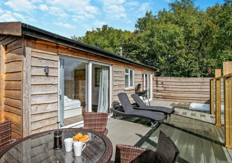 The fully enclosed decked terrace, barbecue & alfresco dining area at Saddleback, Westward Ho!