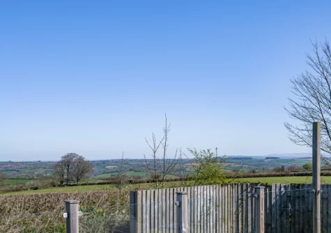 Enjoy far-reaching countryside views from the decked terrace & outdoor sitting area