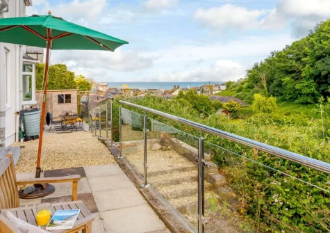 The patio & outdoor sitting area at Safe Harbour, Mevagissey