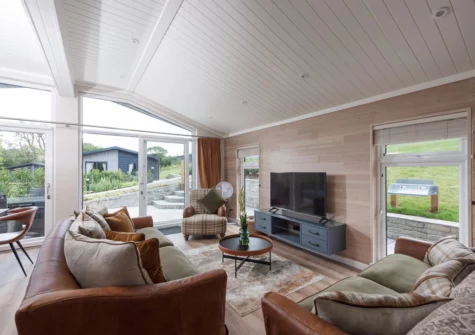 The living area at Saffron Lodge, 24 Roadford Lake Lodges, Broadwoodwidger