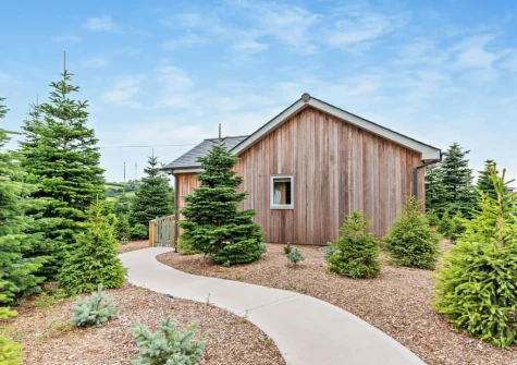 Salcombe Lodge is a stylish retreat with high-end styling and cosy wood burner