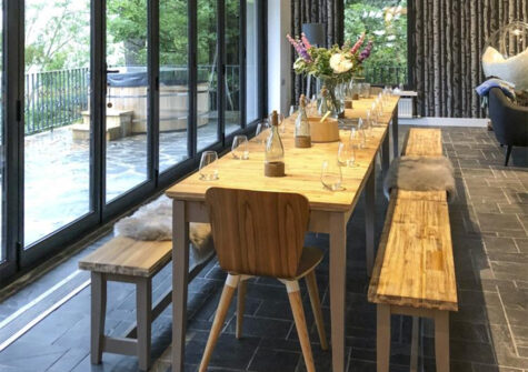 The dining area in the recreation room at Salcombe Retreat, Salcombe