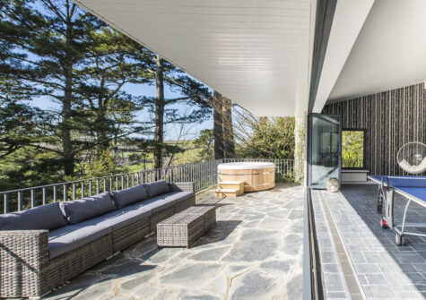 The recreation room terrace & hot tub at Salcombe Retreat, Salcombe