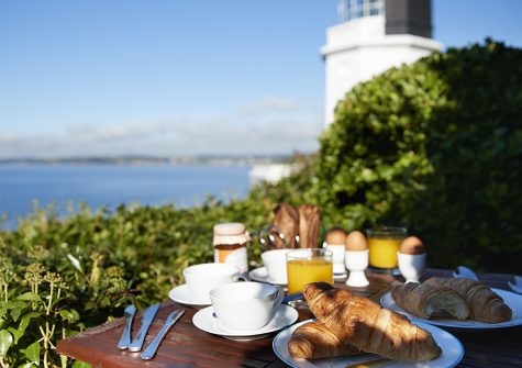 Enjoy breakfast on the patio at Sally Port Cottage, St Anthony