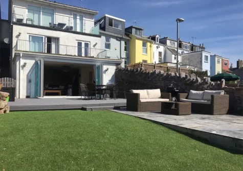 The decked patio, alfresco dining area & garden at Salmon Leap, Brixham