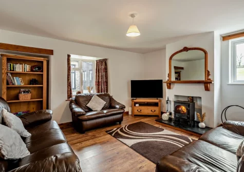 The farmhouse living room at Salterns River, Weare Giffard
