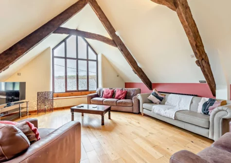 The barn living room at Salterns River, Weare Giffard