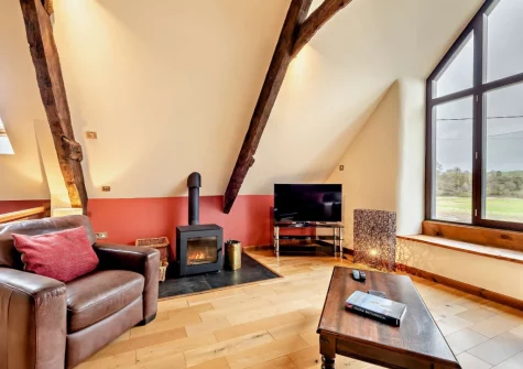 The barn living room at Salterns River, Weare Giffard