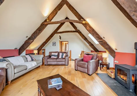 The barn living room at Salterns River, Weare Giffard