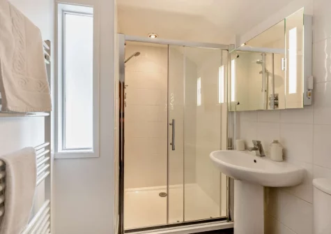 The barn shower room at Salterns River, Weare Giffard