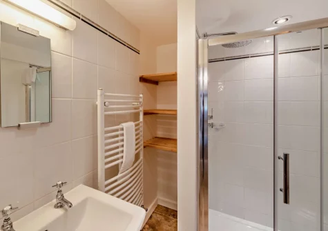 The farmhouse ground floor shower room at Salterns River, Weare Giffard