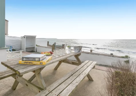 The patio terrace & alfresco dining area at Samphire Cottage, Porthleven
