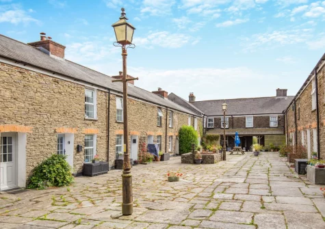 Samphire Cottage is set around a charming courtyard to the front