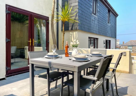 The enclosed patio & alfresco dining area at Samphire, Padstow