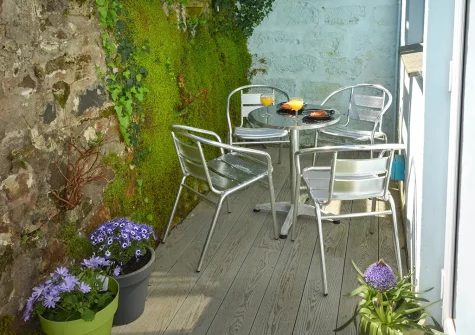 The decked outdoor sitting area at Sam's Place, St Ives