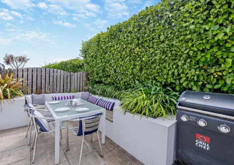 The patio, barbecue & alfresco dining area at Sandals, Padstow
