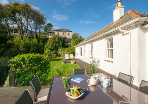 The decked patio, alfresco dining area & garden at Sandbanks, Carbis Bay