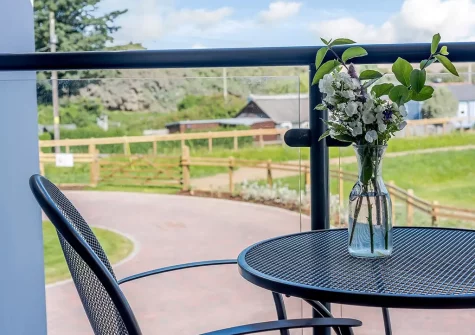 Bedroom #1 balcony & outdoor sitting area at Sandbars, Instow
