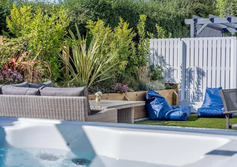 The hot tub, outdoor sitting area & garden at Sandbars, Instow