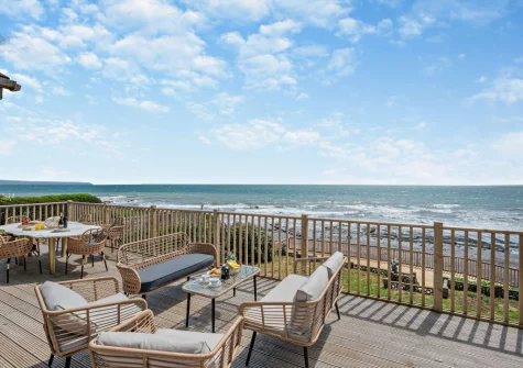 The decked patio, alfresco dining & outdoor sitting area at Sandpipers, Downderry