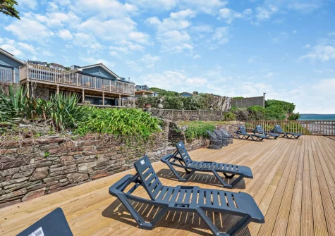 The garden, decked terrace & outdoor sitting area at Sandpipers, Downderry