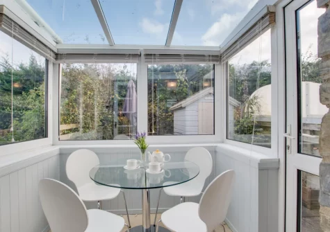 The conservatory dining area at Sands, Padstow