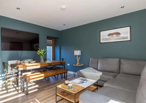 The living & dining area at Sandseekers Barn, Mawgan Porth