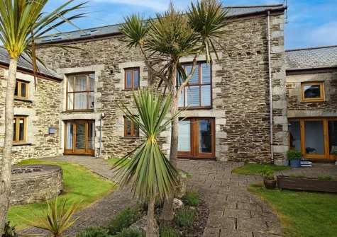 Sandseekers Barn is a dog-friendly holiday home with shared access to a beach path and paddock with games area &