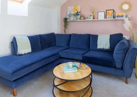 Sandseekers Barn, Mawgan Porth is a chic three-storey retreat in a converted barn complex, featuring stunning sea views, modern coastal interiors, and a sun-trap garden, perfectly positioned between Padstow & Newquay for exploring Cornwall's best.