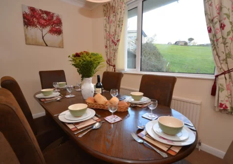 The dining area at Sandy Bay Bungalow, Instow