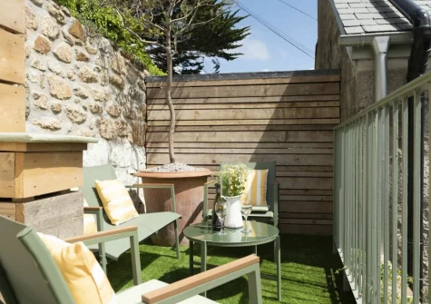 The split level outdoor sitting area at Sandy Boobies, St Ives