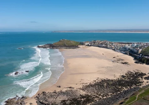Spectacular sunsets and the chance to see dolphins & seals playing alongside you in the waves are just two of the reasons Porthmeor Beach is a popular spot in the summer