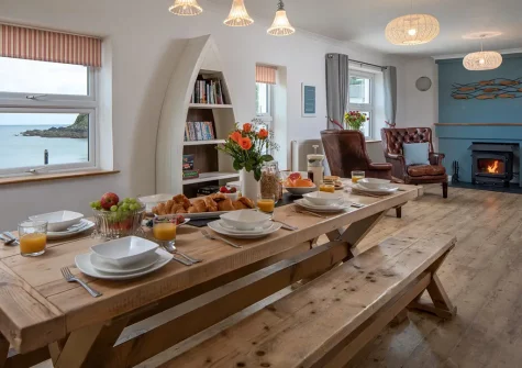 Enjoy fantastic sea views from the dining area at Sandy Cove, Portmellon