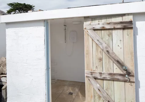 The external wet room at Sandy Cove, Portmellon