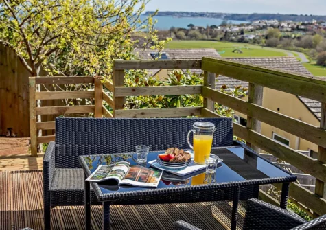 The decked terrace & alfresco dining area at Sandy Toes, Paignton