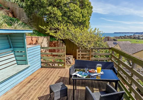 The decked terrace & alfresco dining area at Sandy Toes, Paignton
