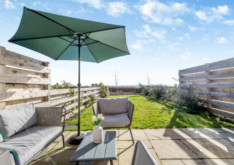 The patio, outdoor sitting area & garden at Sandy Toes, Stoke Fleming