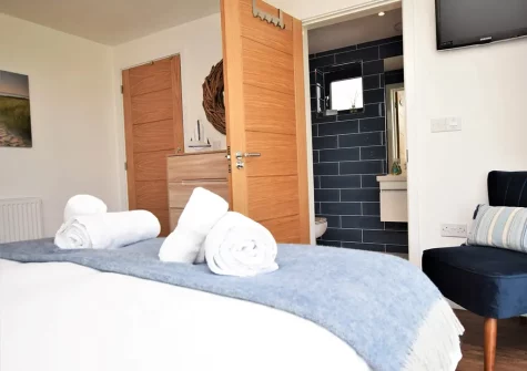 Bedroom #2 & en-suite shower room at Sandy Toes, Westward Ho!