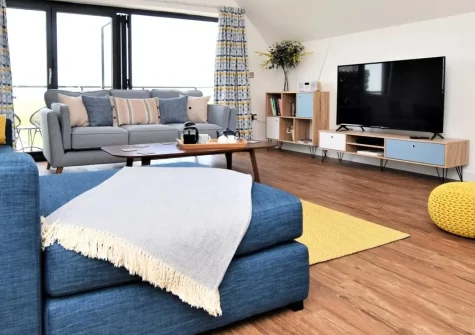 Sandy Toes, Westward Ho! is a magnificent luxury four-bedroom holiday home featuring a private hot tub, stunning sea views, and fully enclosed dog-friendly garden. The perfect coastal retreat for exploring North Devon's beaches and attractions.