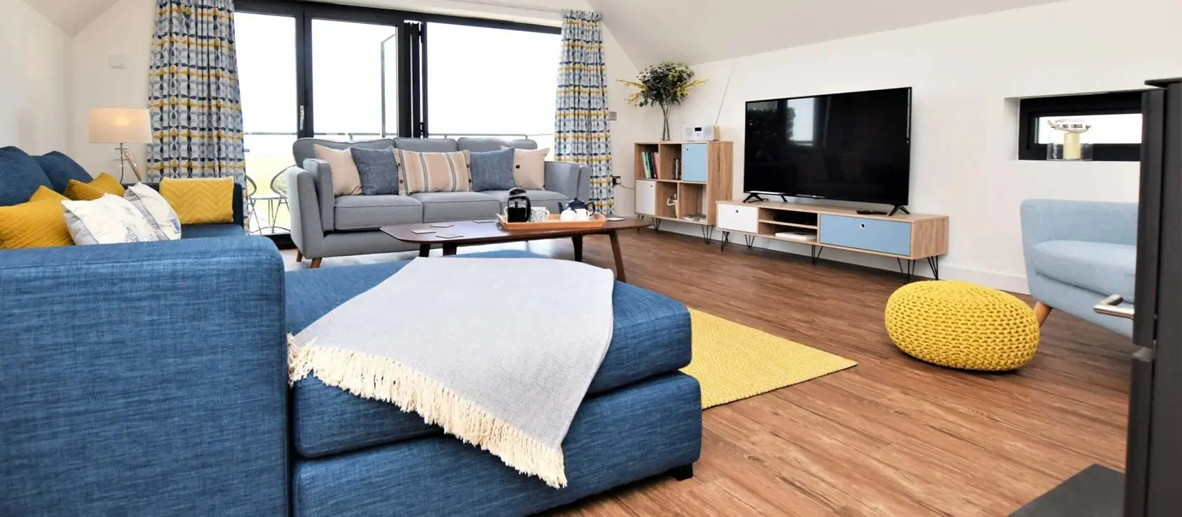 Sandy Toes, Westward Ho! is a magnificent luxury four-bedroom holiday home featuring a private hot tub, stunning sea views, and fully enclosed dog-friendly garden. The perfect coastal retreat for exploring North Devon's beaches and attractions.