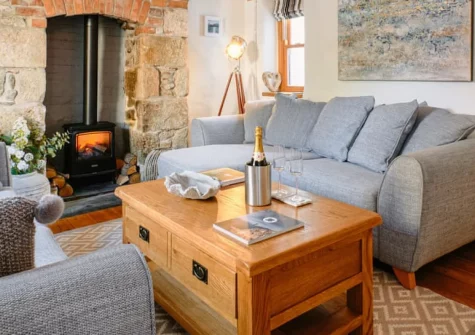 Scallop Cottage, Porthleven is a charming three-bedroom retreat in the heart of this harbour town, featuring cosy period character, coastal styling, and a wonderful location steps from excellent restaurants, independent shops, and beaches.