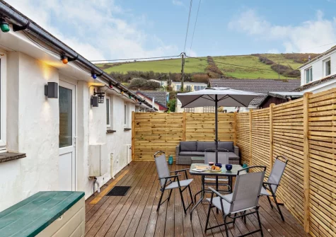 The decked patio, barbecue & alfresco dining area at Sea Birds, Croyde