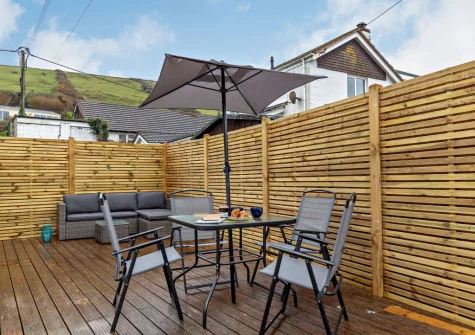The decked patio, barbecue & alfresco dining area at Sea Birds, Croyde