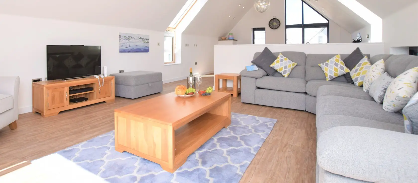 Sea Breeze, Westward Ho! is a luxurious three-bedroom retreat with a private hot tub and modern amenities just moments from golden sands. Featuring smart TVs, a Nintendo Wii and an outdoor entertainment space, it's perfect for family holidays.
