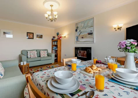 The living & dining area at Sea Escape, Widemouth Bay